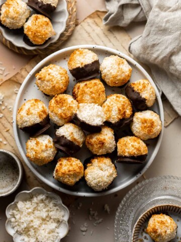 Coconut macaroons are crispy on the outside with a soft and chewy center. Dip or drizzle with chocolate for an even more delicious flavor combo. | aheadofthyme.com