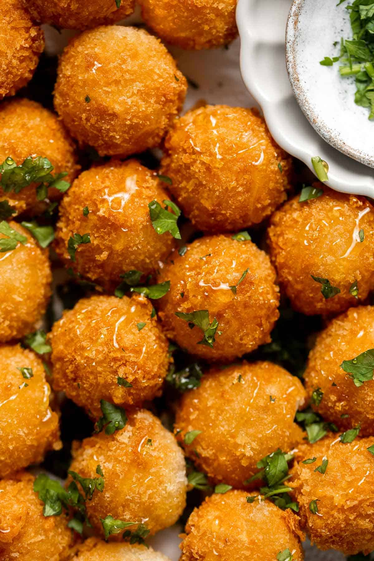 Fried Goat Cheese Balls are flavorful, delicious, and easy to make. With creamy, melty cheese oozing out of a crunchy, golden crust in every bite. | aheadofthyme.com