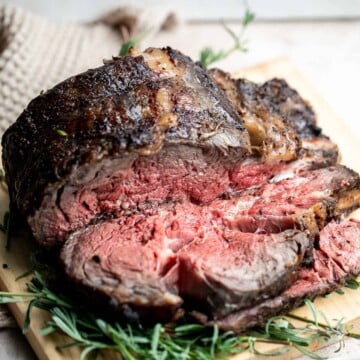 This Prime Rib Roast is a tender and juicy cut of beef marbled with fat. It is incredibly flavorful, delicious, and good — flavored with simple ingredients. | aheadofthyme.com