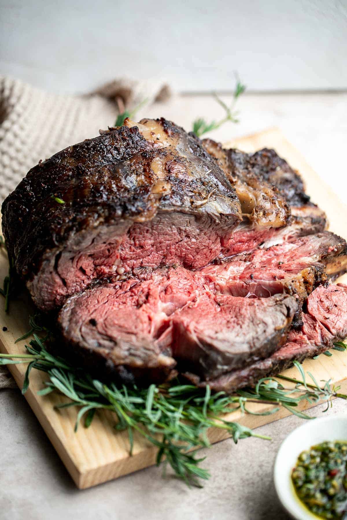 This Prime Rib Roast is a tender and juicy cut of beef marbled with fat. It is incredibly flavorful, delicious, and good — flavored with simple ingredients. | aheadofthyme.com