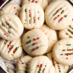 Whipped Shortbread Cookies are sweet and buttery cookies that melt in your mouth. These light tea time treats have crisp edges and a crumbly center. | aheadofthyme.com
