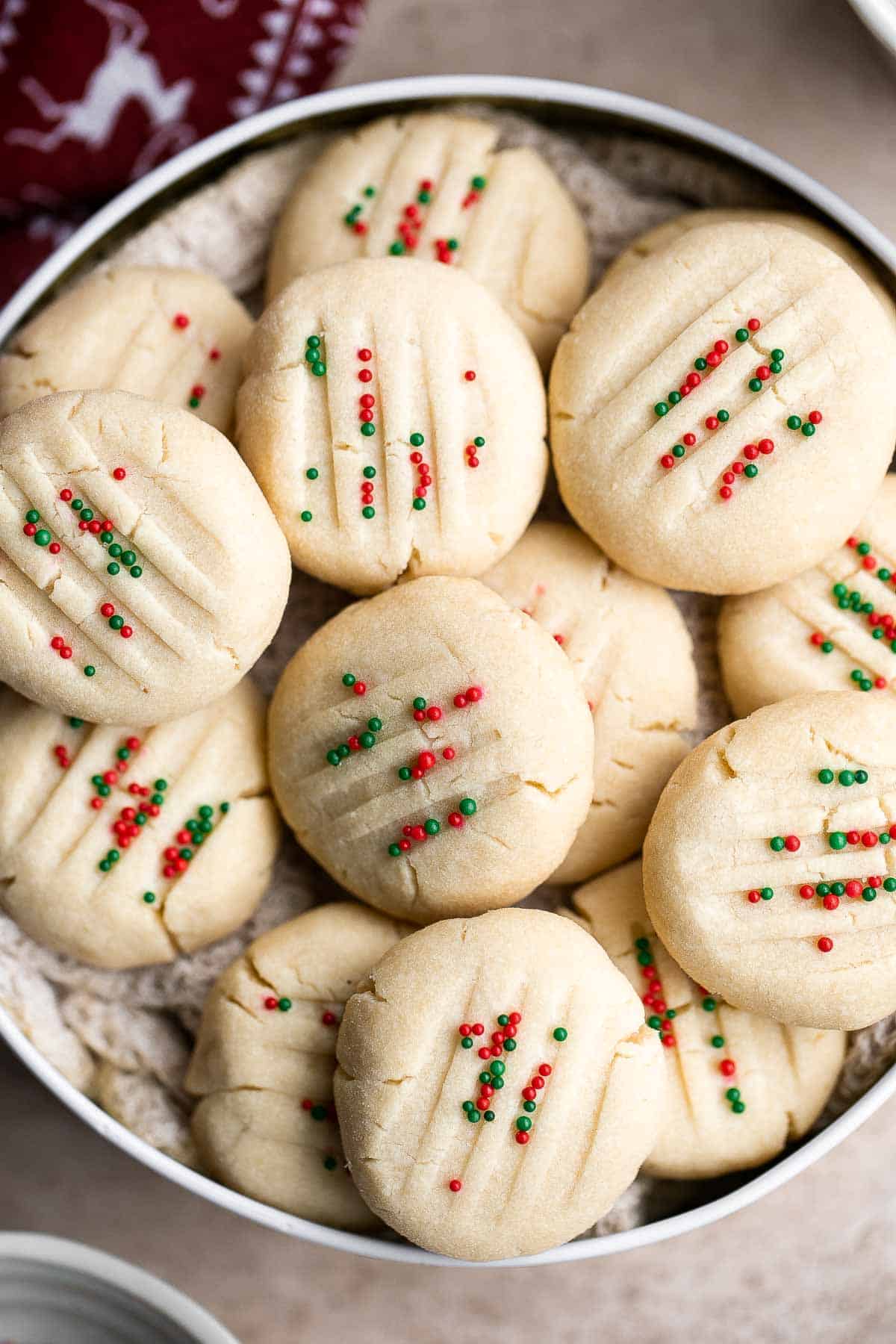 Whipped Shortbread Cookies are sweet and buttery cookies that melt in your mouth. These light tea time treats have crisp edges and a crumbly center. | aheadofthyme.com