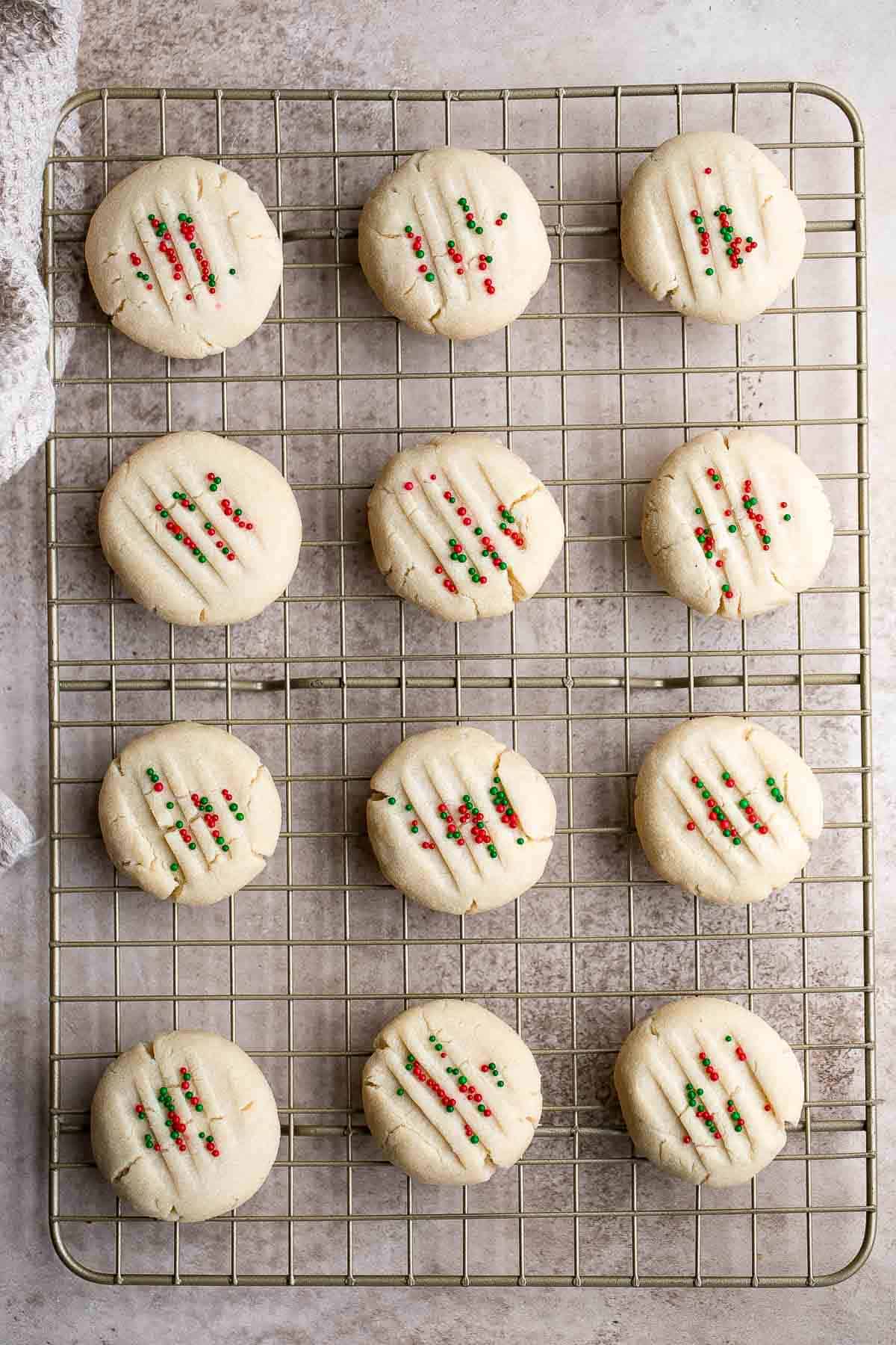 Whipped Shortbread Cookies are sweet and buttery cookies that melt in your mouth. These light tea time treats have crisp edges and a crumbly center. | aheadofthyme.com