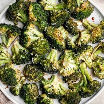 Balsamic Roasted Broccoli is a quick easy side dish made with tender, crispy broccoli tossed in a flavorful 5-ingredient glaze and is ready in 25 minutes. | aheadofthyme.com