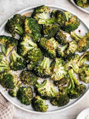 Balsamic Roasted Broccoli is a quick easy side dish made with tender, crispy broccoli tossed in a flavorful 5-ingredient glaze and is ready in 25 minutes. | aheadofthyme.com