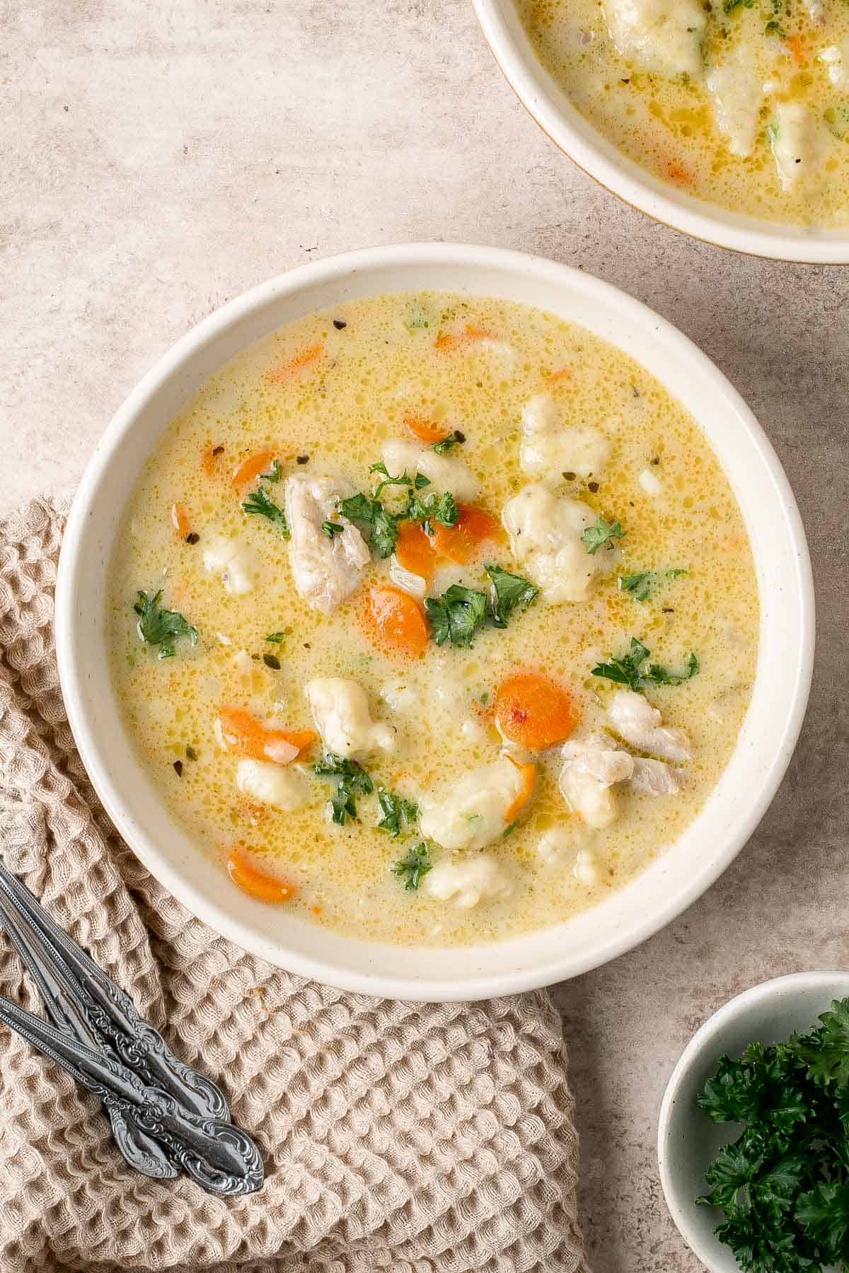 Chicken and Dumplings is a classic chicken soup that is hearty, comforting, and nourishing. Plus, it is quick and easy to make in one pot in 40 minutes. | aheadofthyme.com