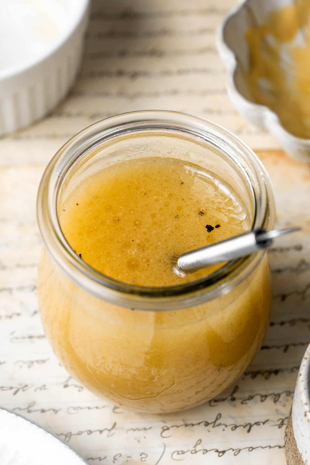 Honey mustard dressing is a sweet and tangy sauce that adds flavor to salads, sandwiches, meats, and more. Make it in minutes with a few simple ingredients. | aheadofthyme.com