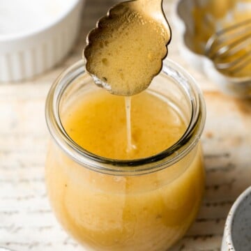 Honey mustard dressing is a sweet and tangy sauce that adds flavor to salads, sandwiches, meats, and more. Make it in minutes with a few simple ingredients. | aheadofthyme.com