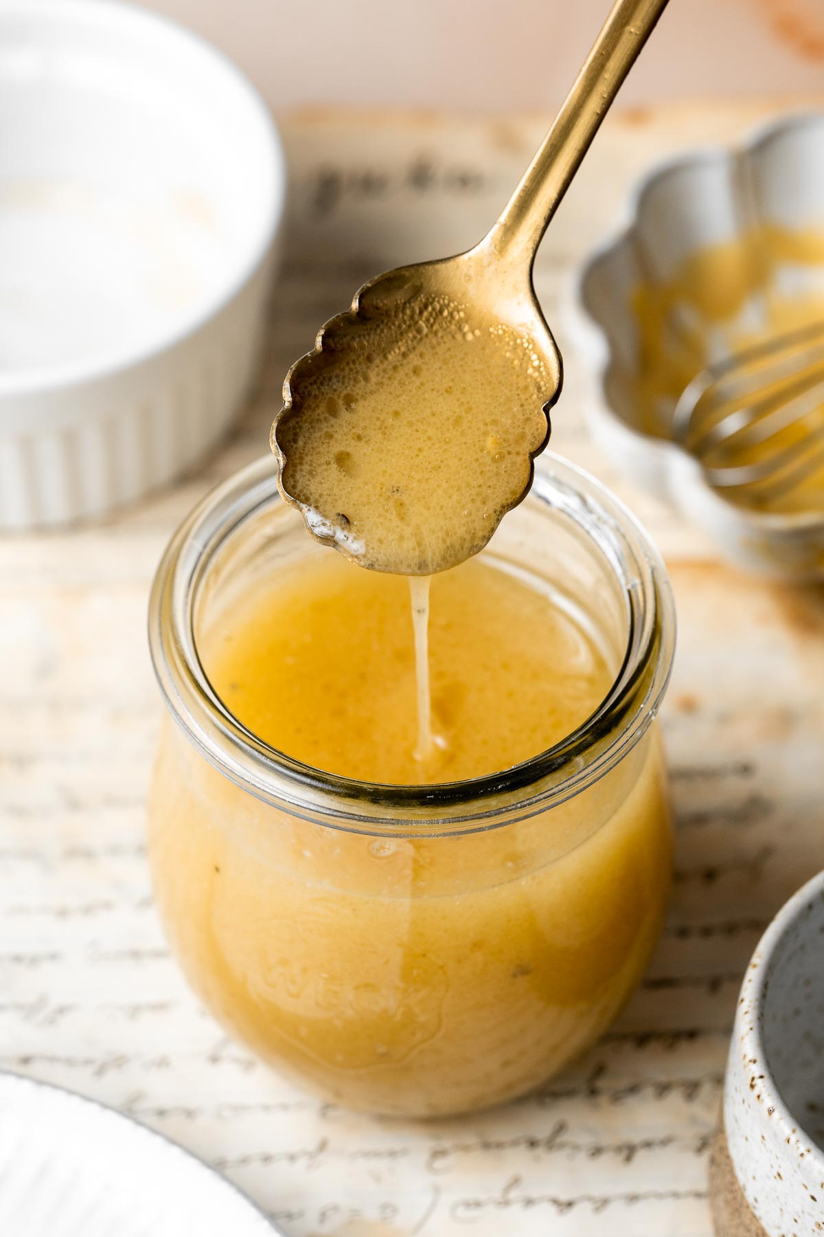 Honey mustard dressing is a sweet and tangy sauce that adds flavor to salads, sandwiches, meats, and more. Make it in minutes with a few simple ingredients. | aheadofthyme.com