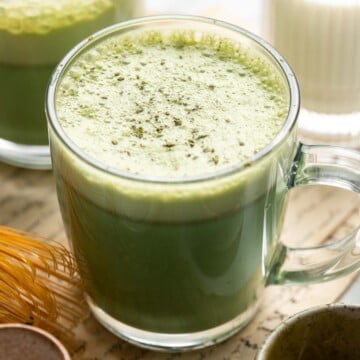 Homemade Matcha Latte is an earthy green tea drink topped with warm, frothy milk. Make this creamy and delicious drink in 5 minutes with 3 ingredients. | aheadofthyme.com