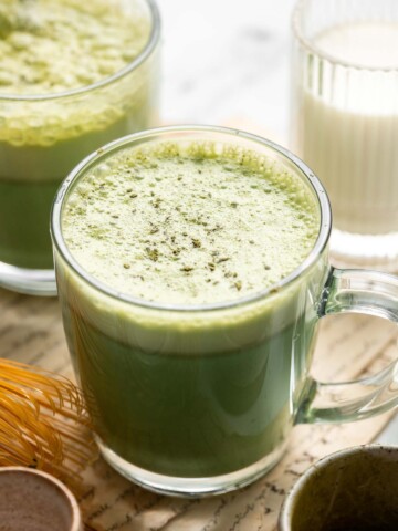 Homemade Matcha Latte is an earthy green tea drink topped with warm, frothy milk. Make this creamy and delicious drink in 5 minutes with 3 ingredients. | aheadofthyme.com