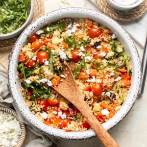 Mediterranean Couscous Salad is healthy, flavorful, and easy to make. It's packed with classic ingredients including couscous, fresh veggies, and feta. | aheadofthyme.com