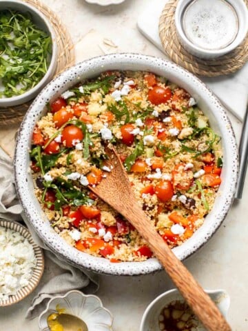 Mediterranean Couscous Salad is healthy, flavorful, and easy to make. It's packed with classic ingredients including couscous, fresh veggies, and feta. | aheadofthyme.com