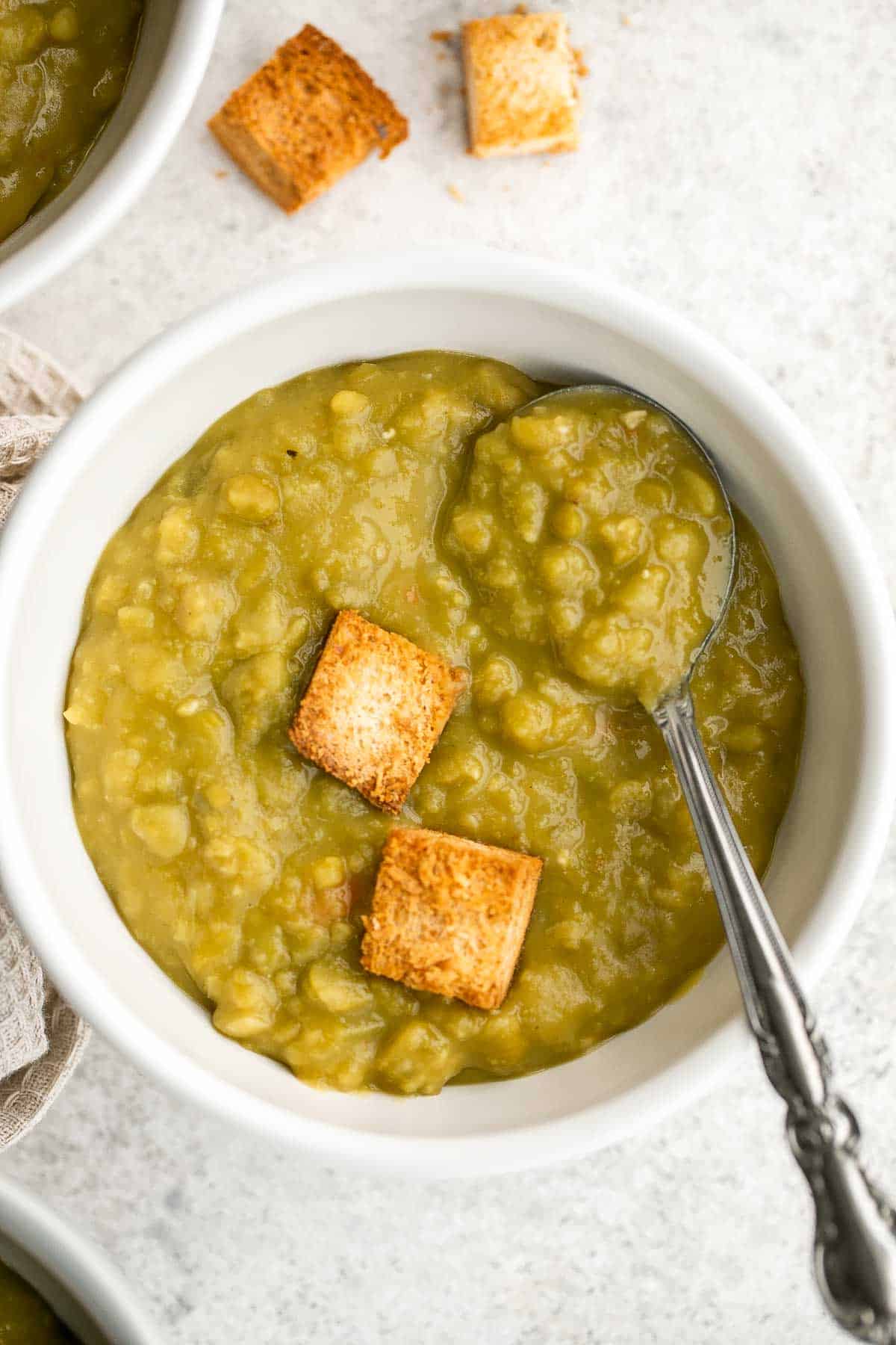 This Vegetarian Split Pea Soup is an easy to make vegan soup that is packed with nutrients and flavor. Loaded with veggies and well-seasoned too. | aheadofthyme.com