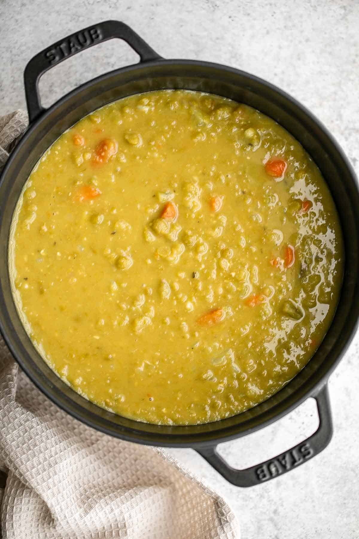 This Vegetarian Split Pea Soup is an easy to make vegan soup that is packed with nutrients and flavor. Loaded with veggies and well-seasoned too. | aheadofthyme.com