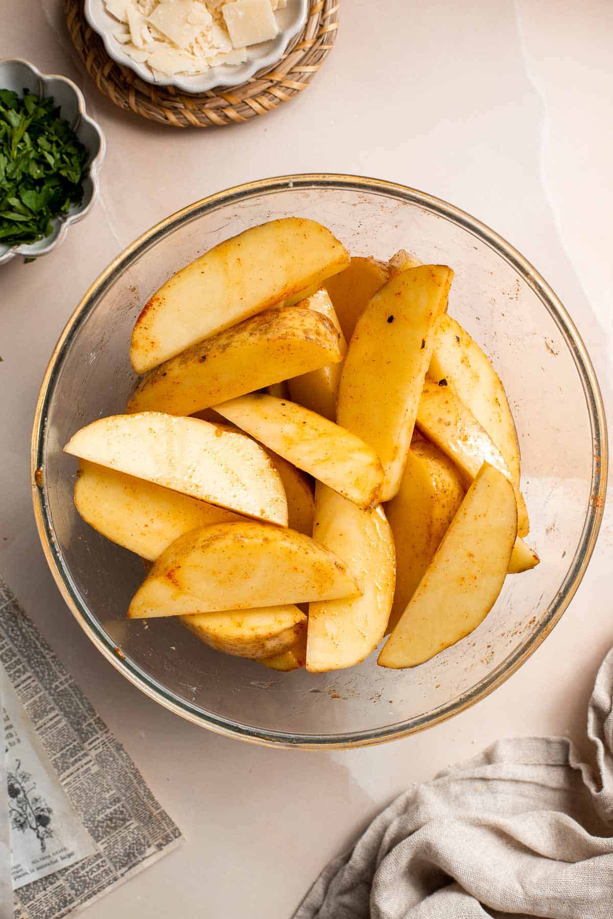 Baked Potato Wedges are crispy outside and soft inside — exactly what you want from a potato wedge but without frying! Cook in the oven or air fryer. | aheadofthyme.com