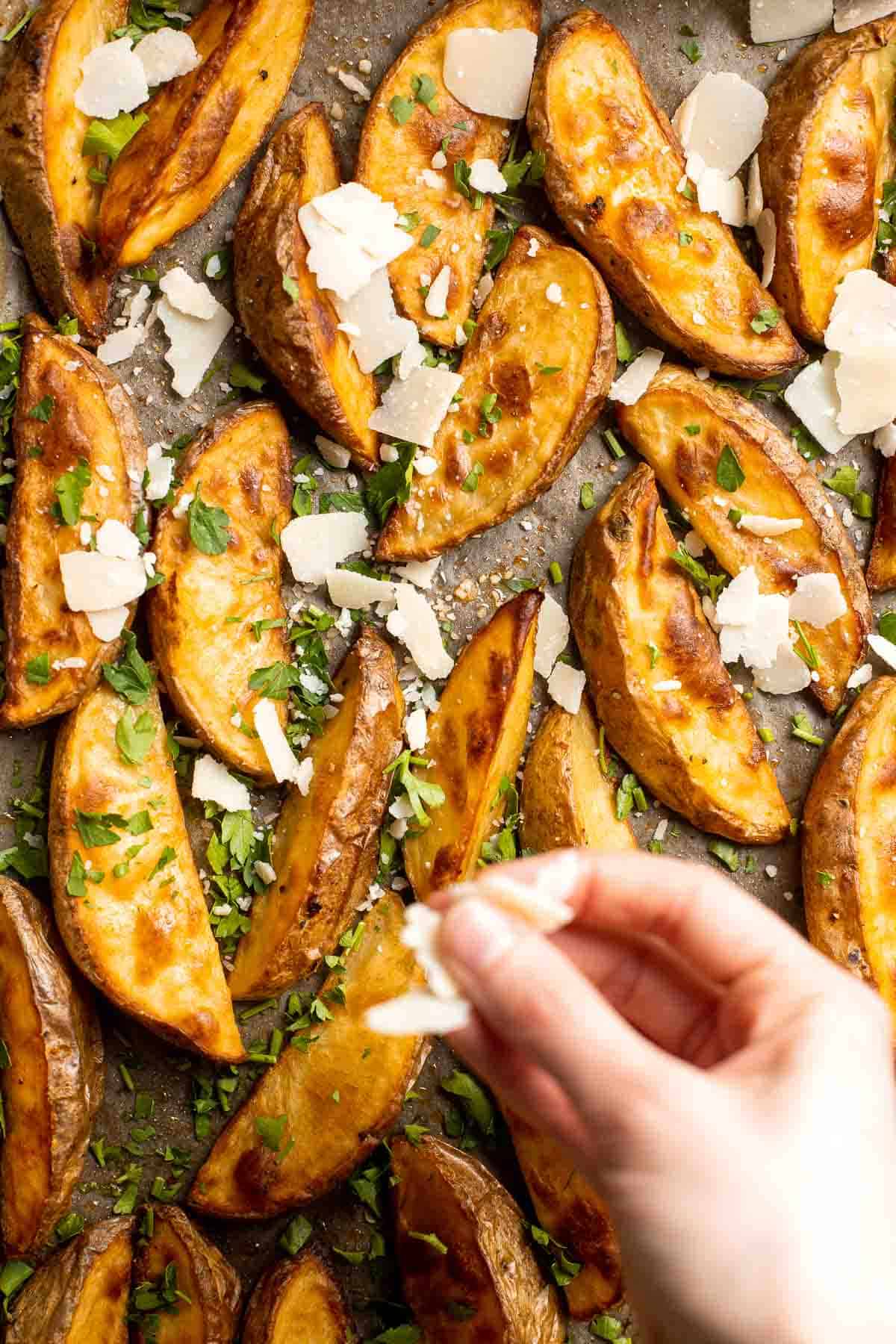 Baked Potato Wedges are crispy outside and soft inside — exactly what you want from a potato wedge but without frying! Cook in the oven or air fryer. | aheadofthyme.com