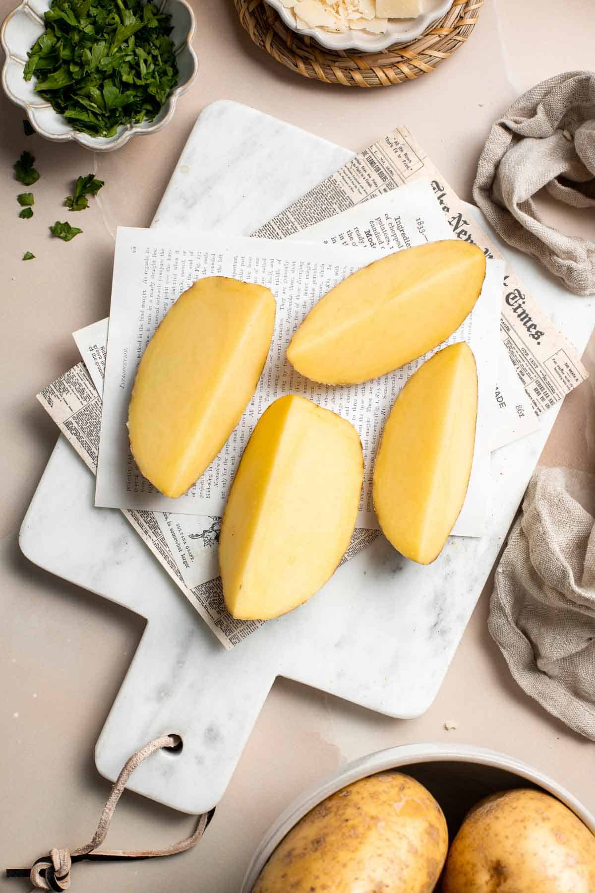 Baked Potato Wedges are crispy outside and soft inside — exactly what you want from a potato wedge but without frying! Cook in the oven or air fryer. | aheadofthyme.com