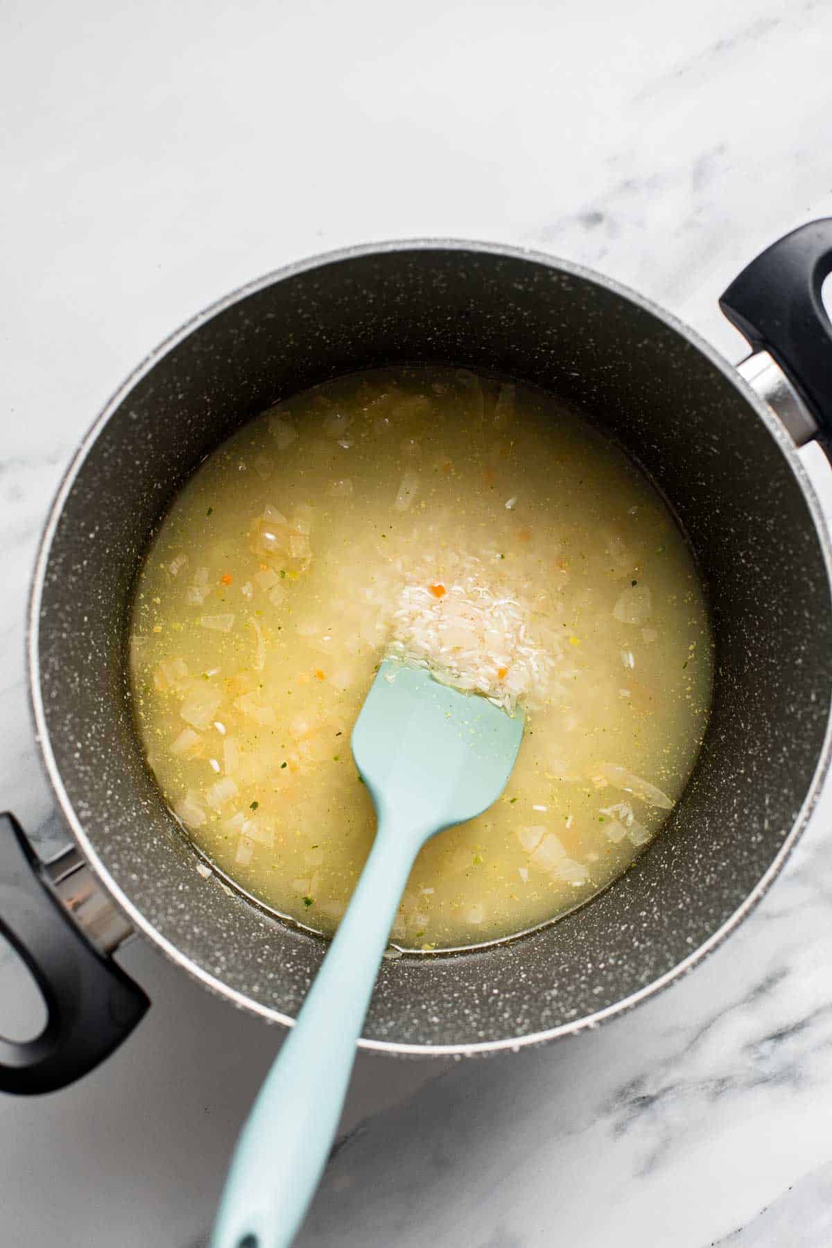 Broccoli Rice is the perfect side dish: creamy, cheesy, healthy, and filling. Plus, it’s quick and easy and all made in one pot in just over 30 minutes. | aheadofthyme.com