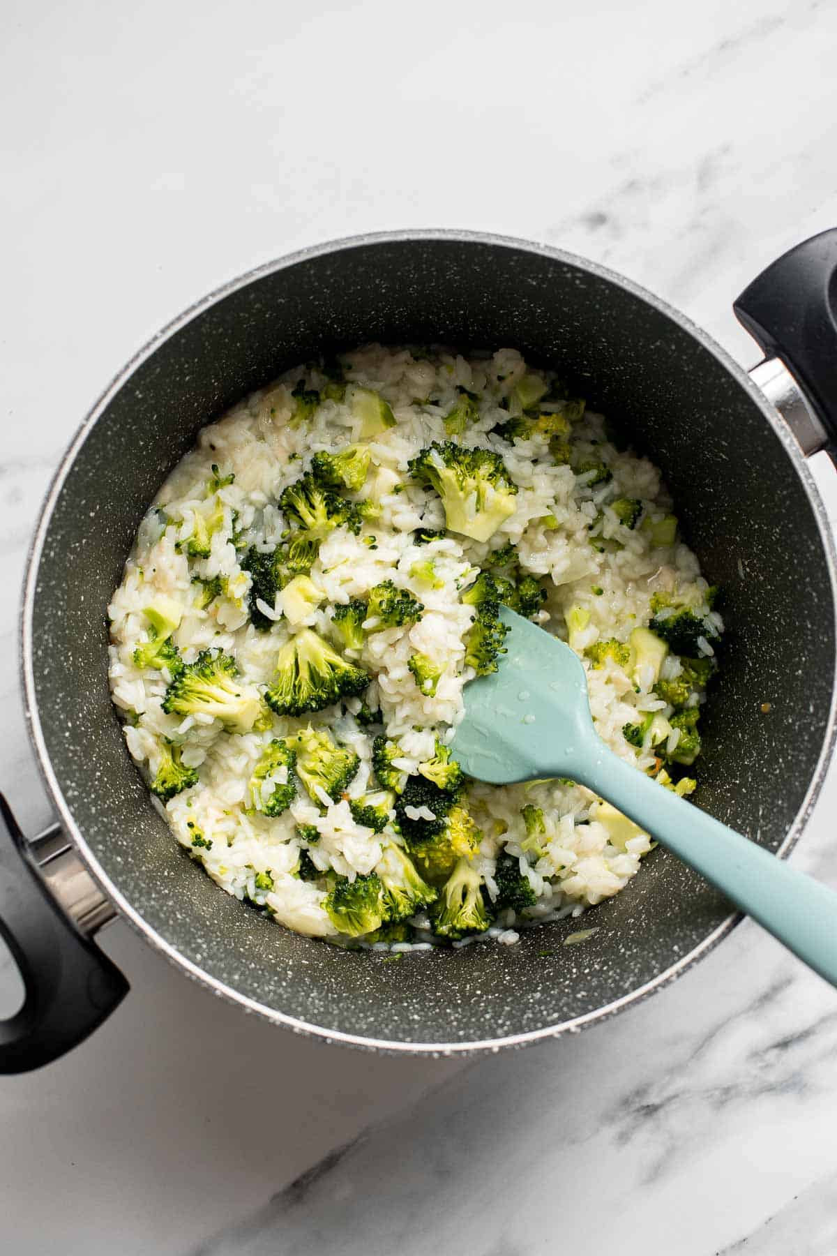 Broccoli Rice is the perfect side dish: creamy, cheesy, healthy, and filling. Plus, it’s quick and easy and all made in one pot in just over 30 minutes. | aheadofthyme.com