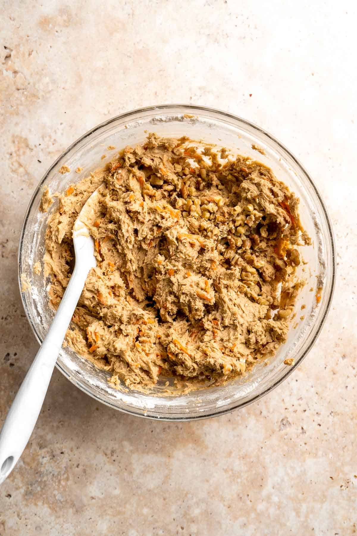 Carrot Cake Cookies are soft, chewy, cake-like cookies with a delicious homemade cream cheese glaze. They taste just like carrot cake but in cookie form. | aheadofthyme.com