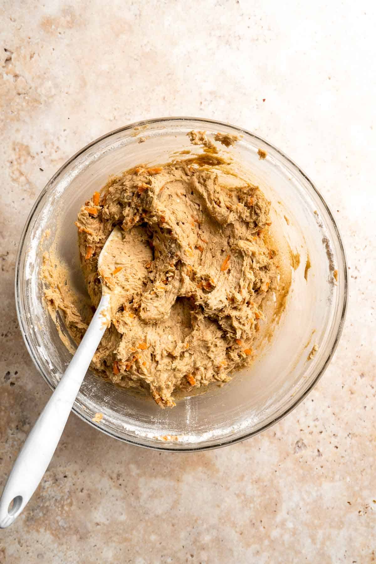 Carrot Cake Cookies are soft, chewy, cake-like cookies with a delicious homemade cream cheese glaze. They taste just like carrot cake but in cookie form. | aheadofthyme.com