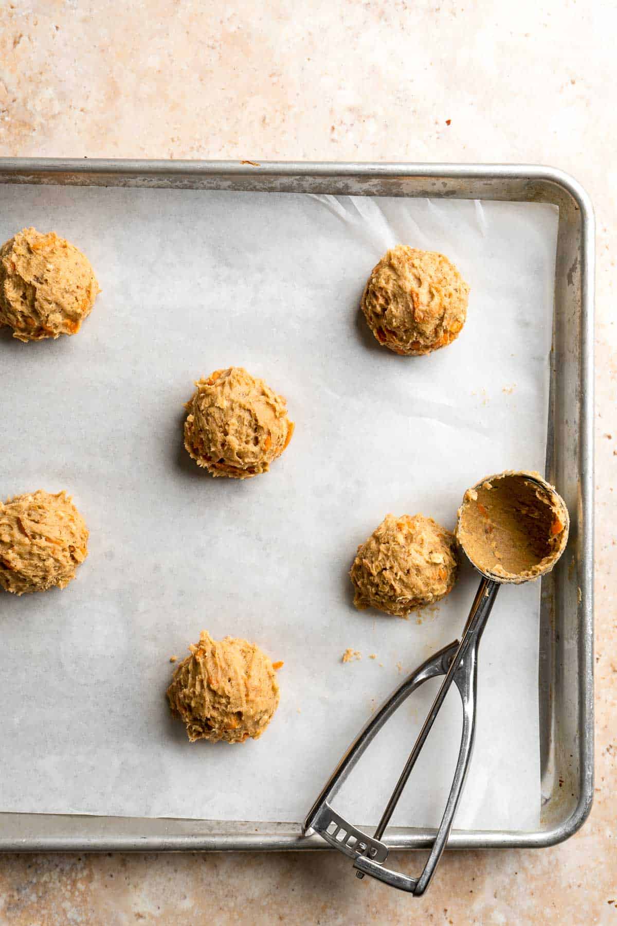 Carrot Cake Cookies are soft, chewy, cake-like cookies with a delicious homemade cream cheese glaze. They taste just like carrot cake but in cookie form. | aheadofthyme.com