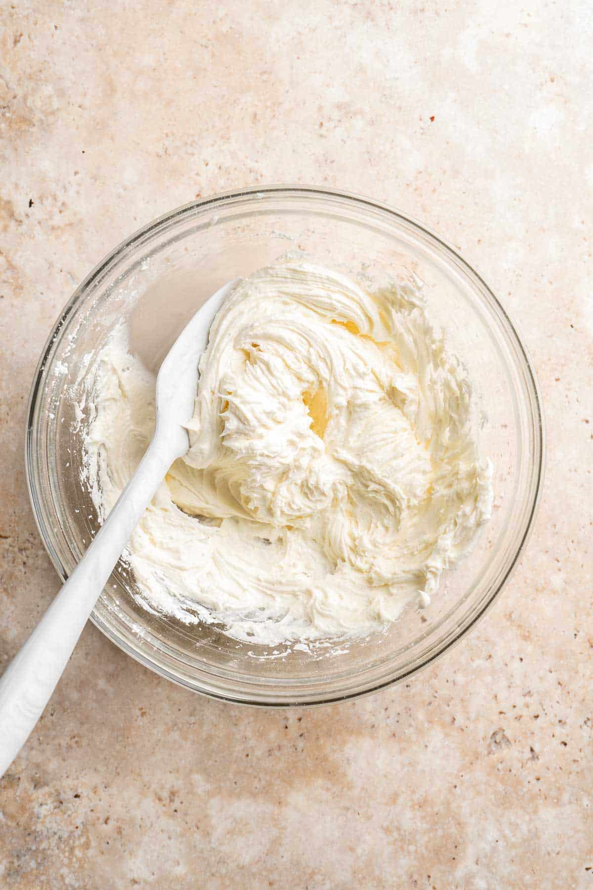 Carrot Cake Cookies are soft, chewy, cake-like cookies with a delicious homemade cream cheese glaze. They taste just like carrot cake but in cookie form. | aheadofthyme.com