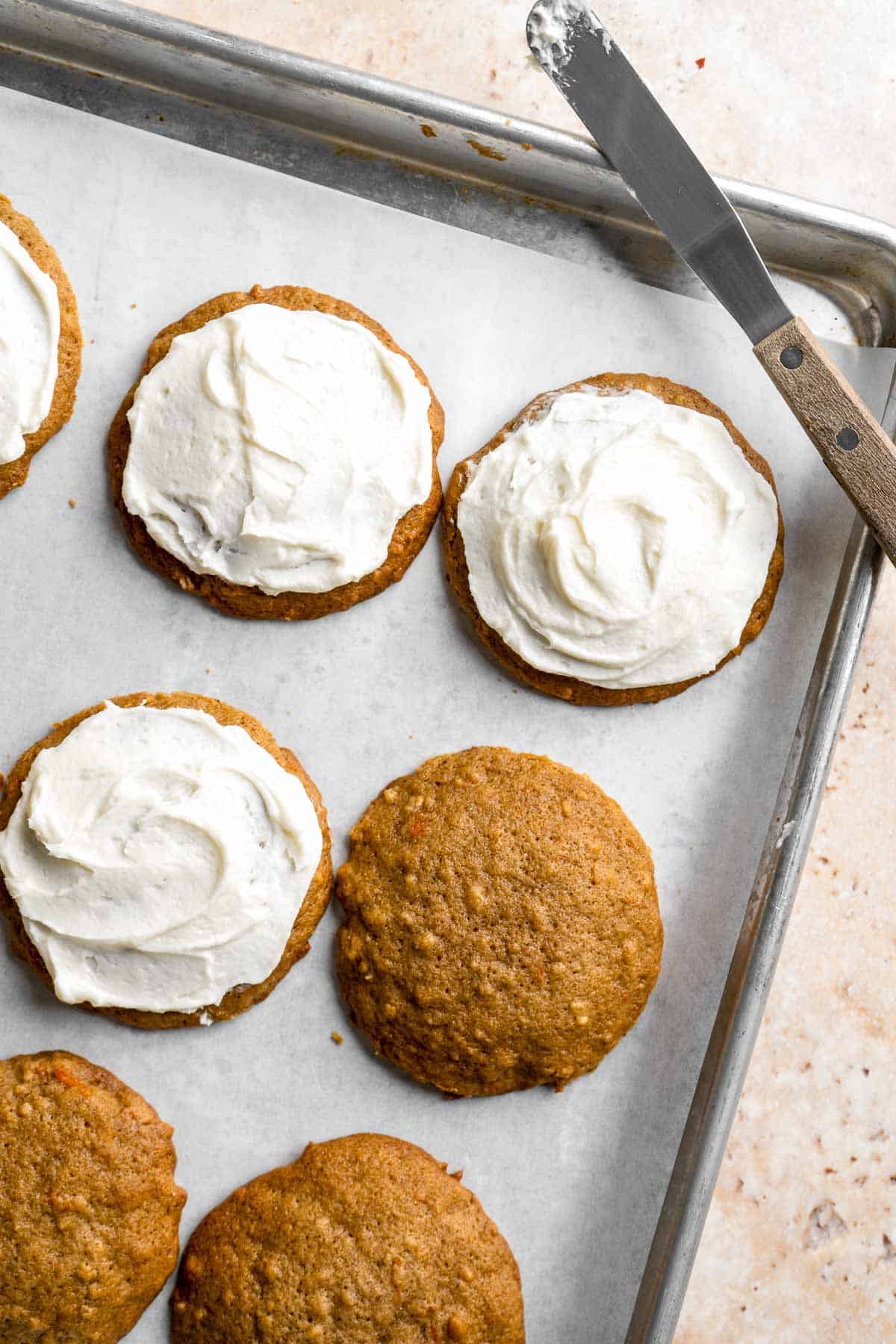 Carrot Cake Cookies are soft, chewy, cake-like cookies with a delicious homemade cream cheese glaze. They taste just like carrot cake but in cookie form. | aheadofthyme.com