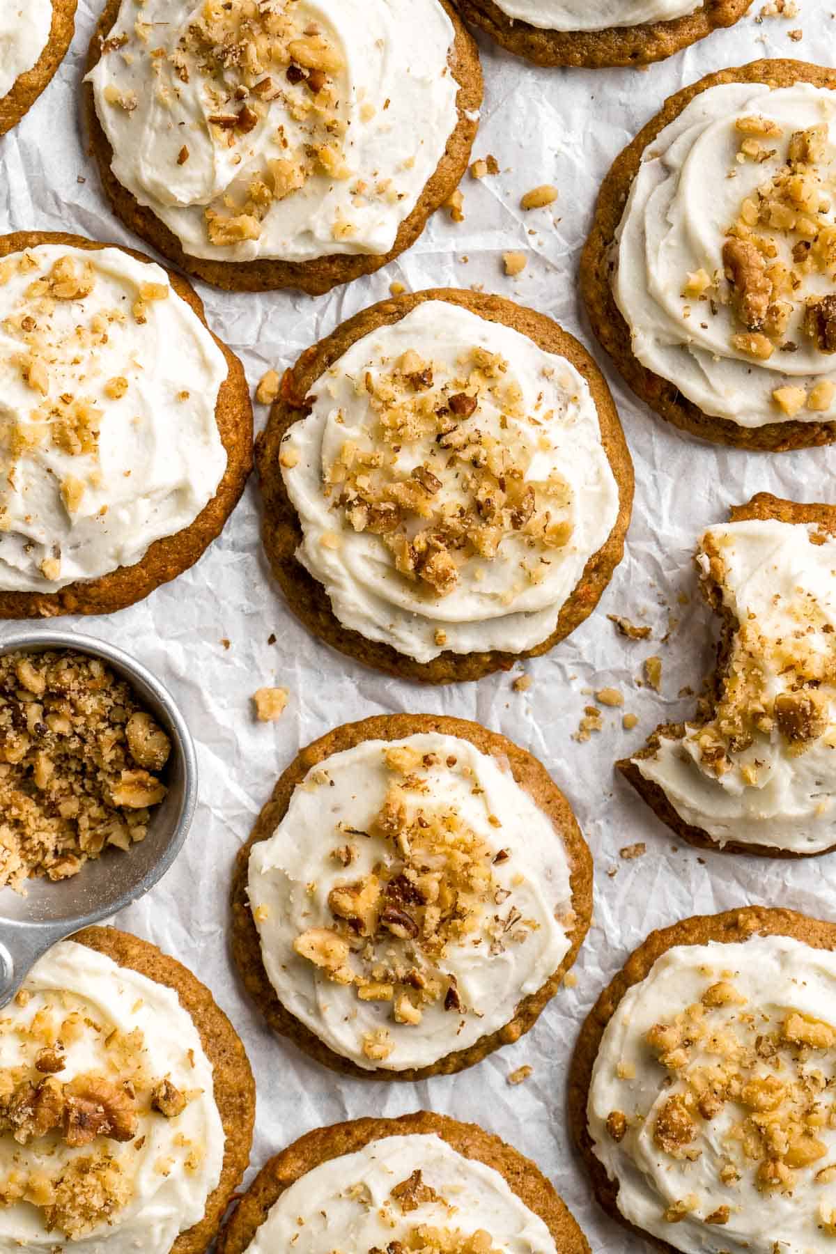 Carrot Cake Cookies are soft, chewy, cake-like cookies with a delicious homemade cream cheese glaze. They taste just like carrot cake but in cookie form. | aheadofthyme.com