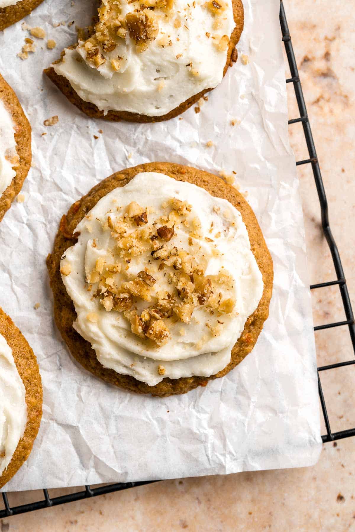 Carrot Cake Cookies are soft, chewy, cake-like cookies with a delicious homemade cream cheese glaze. They taste just like carrot cake but in cookie form. | aheadofthyme.com