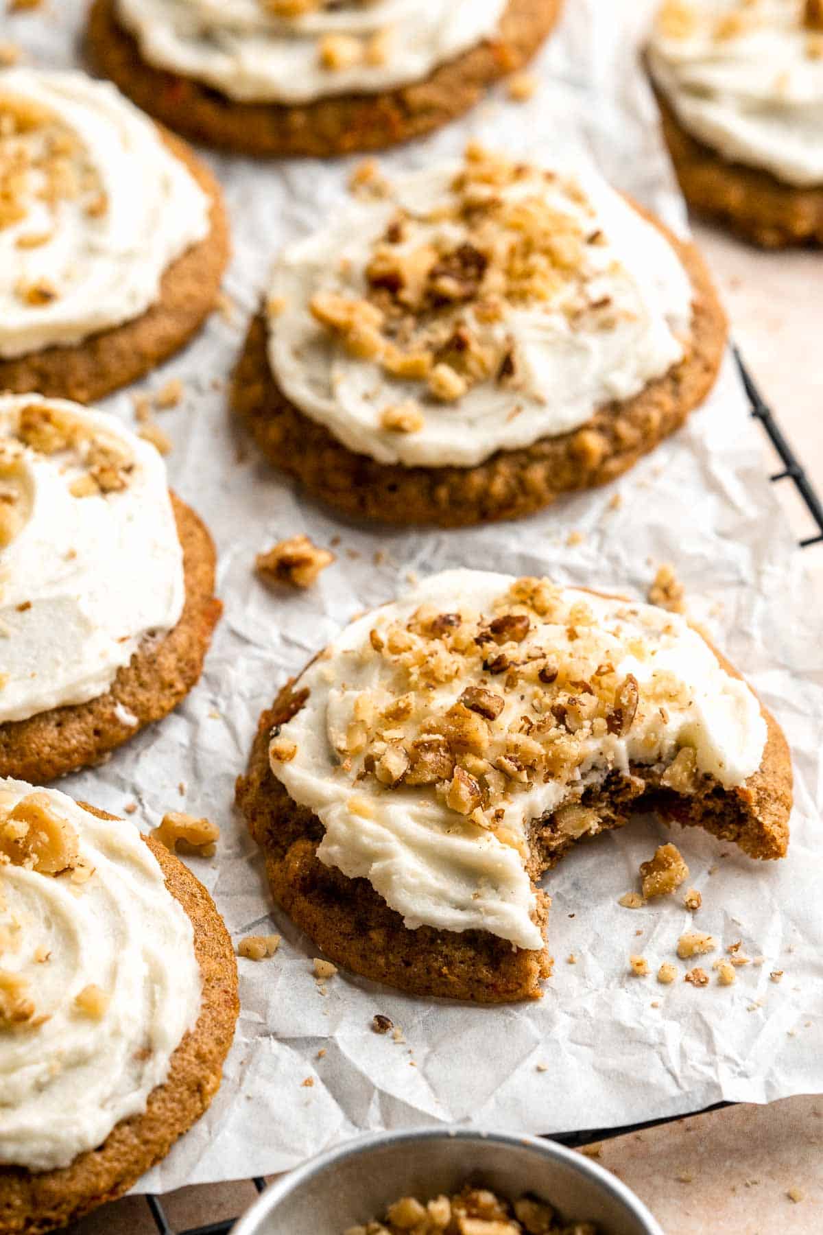 Carrot Cake Cookies are soft, chewy, cake-like cookies with a delicious homemade cream cheese glaze. They taste just like carrot cake but in cookie form. | aheadofthyme.com