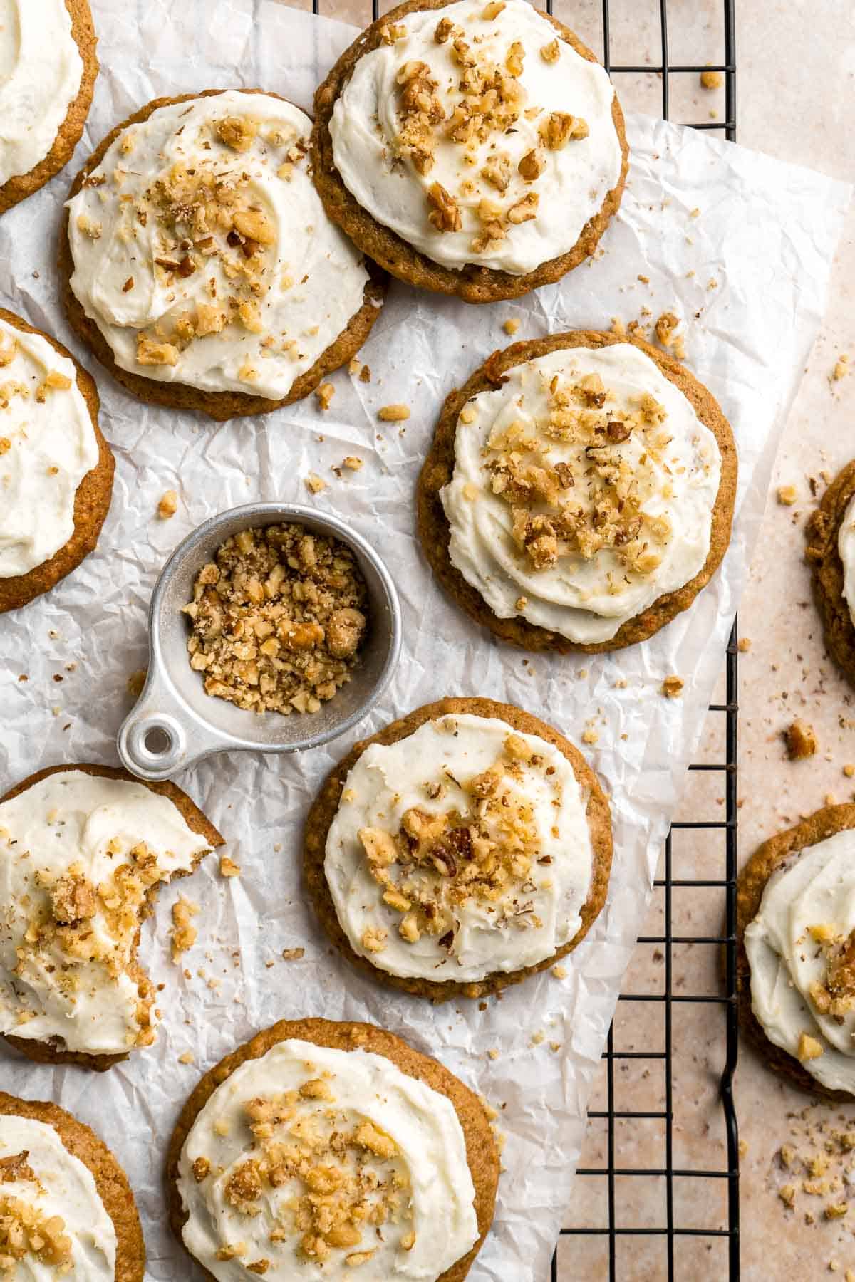 Carrot Cake Cookies are soft, chewy, cake-like cookies with a delicious homemade cream cheese glaze. They taste just like carrot cake but in cookie form. | aheadofthyme.com