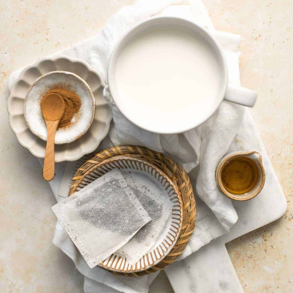 Chai Tea Latte is easy to make at home with aromatic spices and warm foamy milk. It is just as delicious as your favorite coffee shop — if not better! | aheadofthyme.com