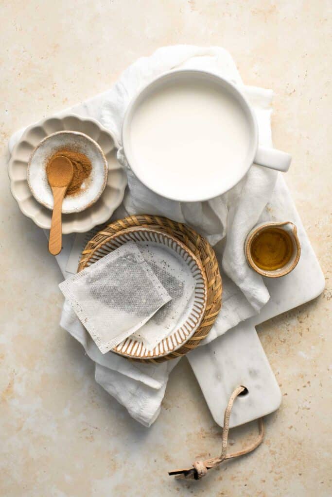Chai Tea Latte is easy to make at home with aromatic spices and warm foamy milk. It is just as delicious as your favorite coffee shop — if not better! | aheadofthyme.com