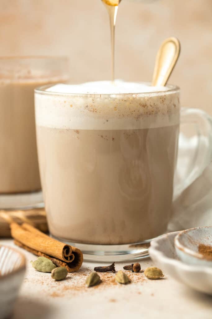 Chai Tea Latte is easy to make at home with aromatic spices and warm foamy milk. It is just as delicious as your favorite coffee shop — if not better! | aheadofthyme.com