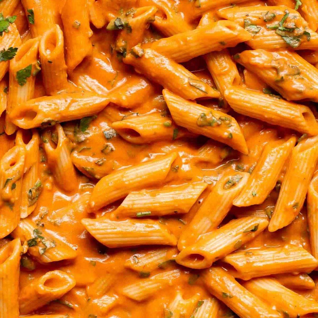 This Creamy Tomato Pasta is a simple and delicious meal made from scratch in 20 minutes with a cream and tomato based sauce that is rich and silky smooth. | aheadofthyme.com