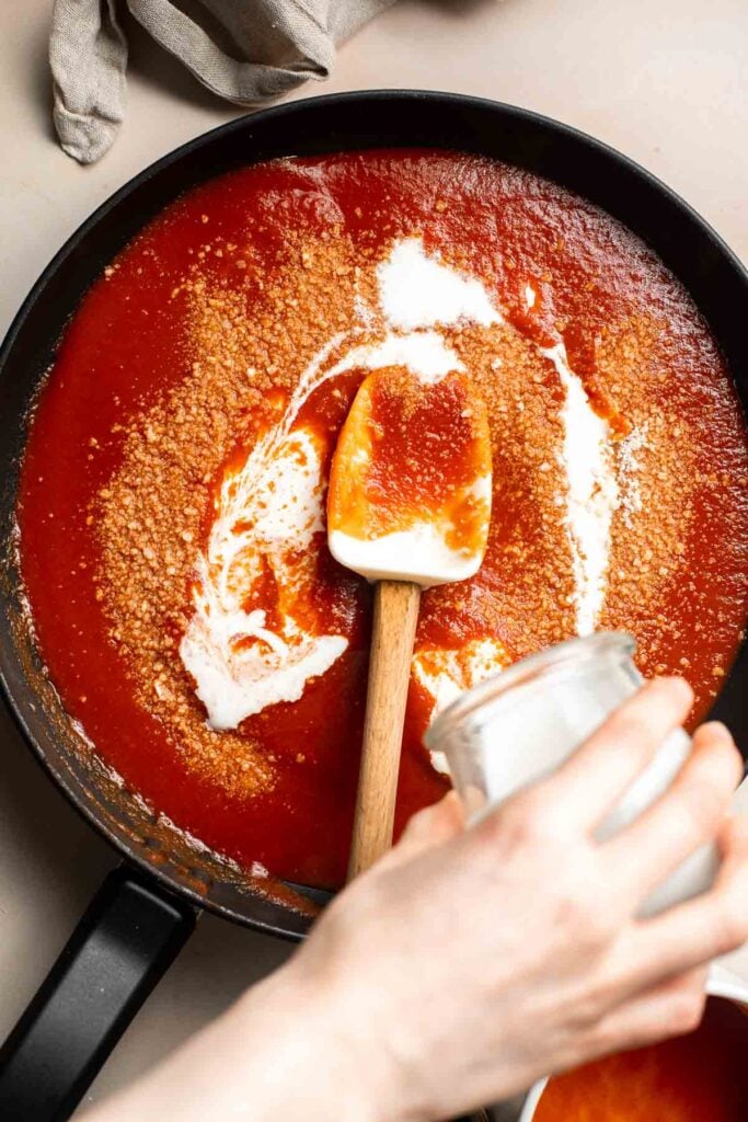 This Creamy Tomato Pasta is a simple and delicious meal made from scratch in 20 minutes with a cream and tomato based sauce that is rich and silky smooth. | aheadofthyme.com