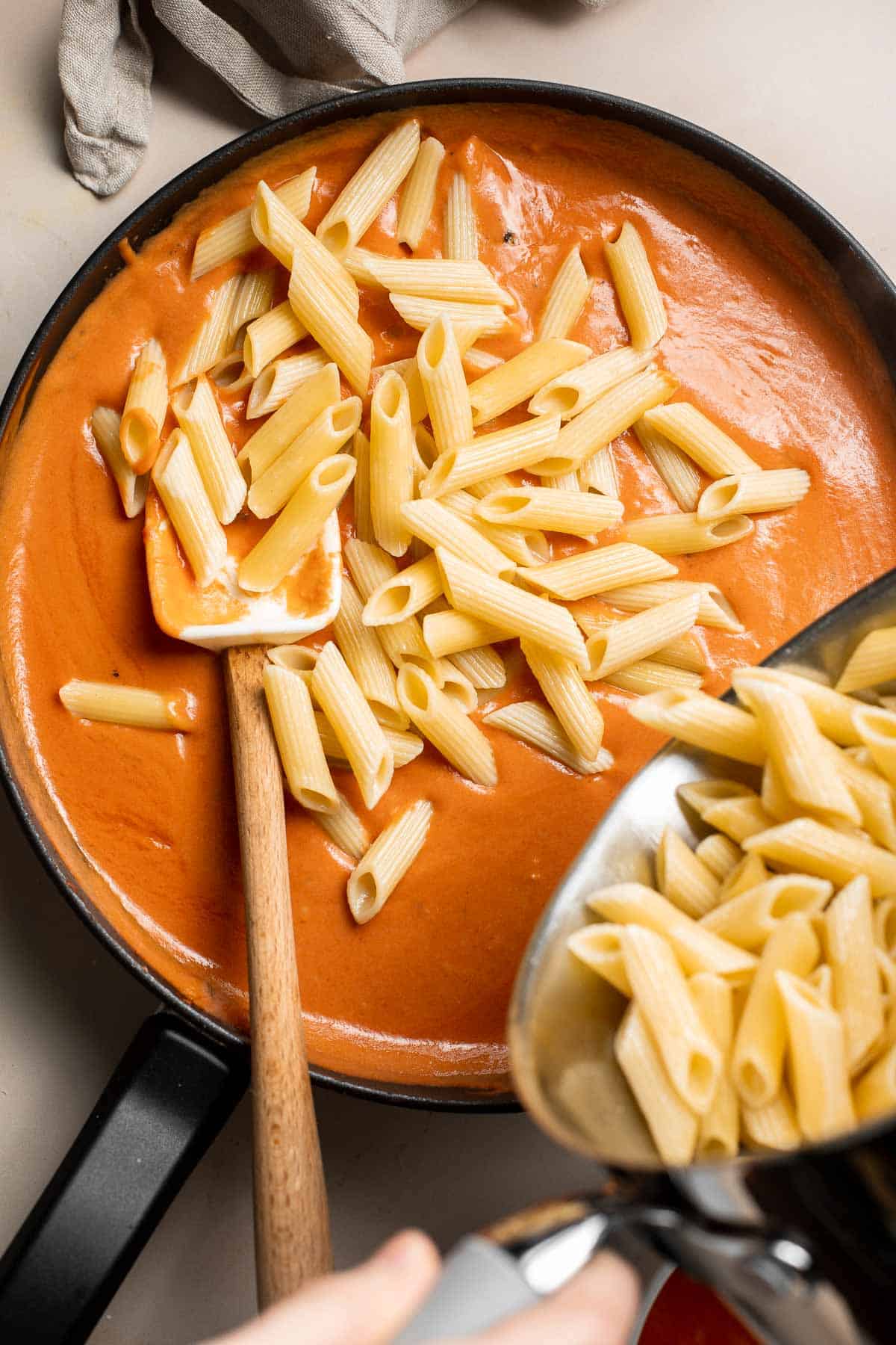 This Creamy Tomato Pasta is a simple and delicious meal made from scratch in 25 minutes with a cream and tomato based sauce that is rich and silky smooth. | aheadofthyme.com