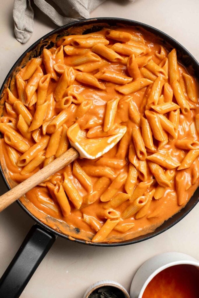 This Creamy Tomato Pasta is a simple and delicious meal made from scratch in 20 minutes with a cream and tomato based sauce that is rich and silky smooth. | aheadofthyme.com