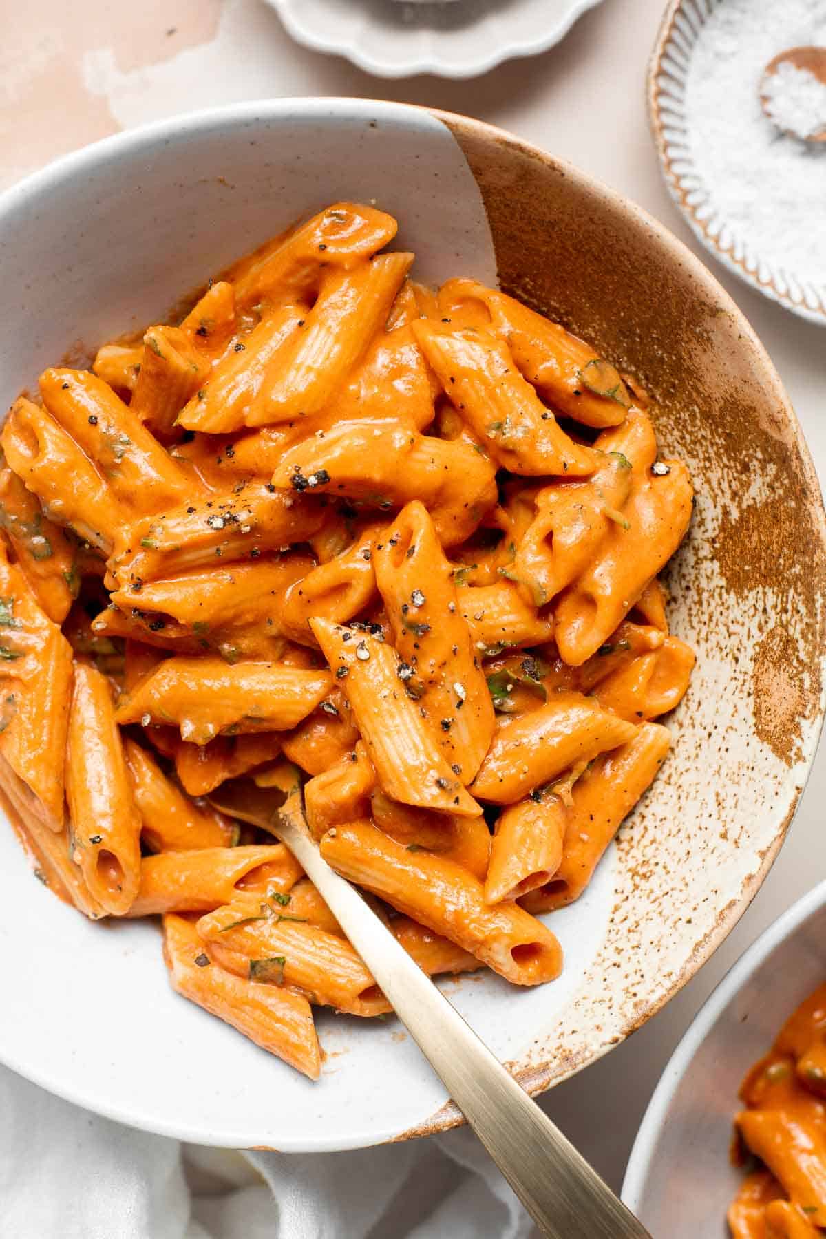 This Creamy Tomato Pasta is a simple and delicious meal made from scratch in 25 minutes with a cream and tomato based sauce that is rich and silky smooth. | aheadofthyme.com