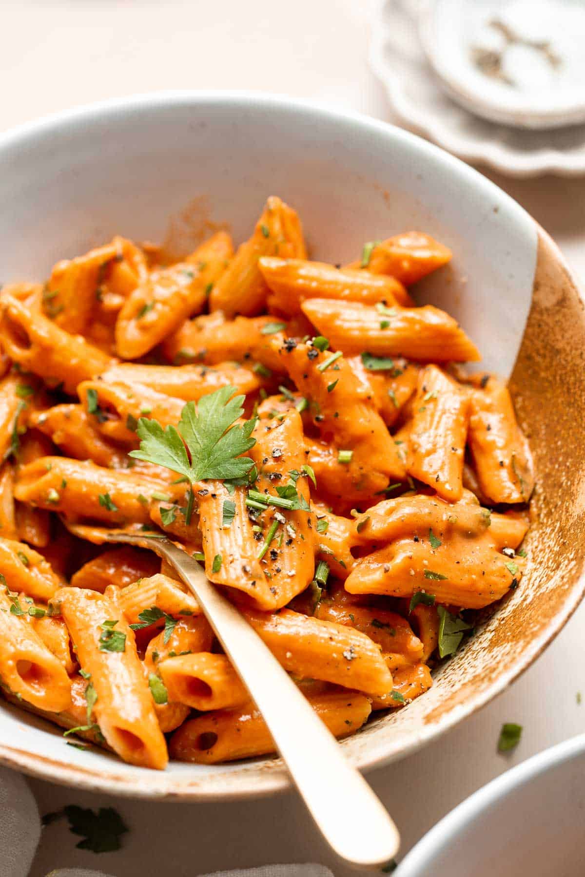 This Creamy Tomato Pasta is a simple and delicious meal made from scratch in 25 minutes with a cream and tomato based sauce that is rich and silky smooth. | aheadofthyme.com