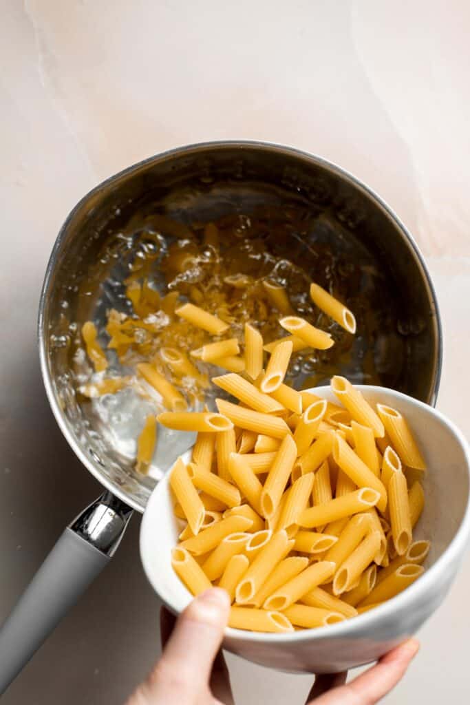 This Creamy Tomato Pasta is a simple and delicious meal made from scratch in 20 minutes with a cream and tomato based sauce that is rich and silky smooth. | aheadofthyme.com