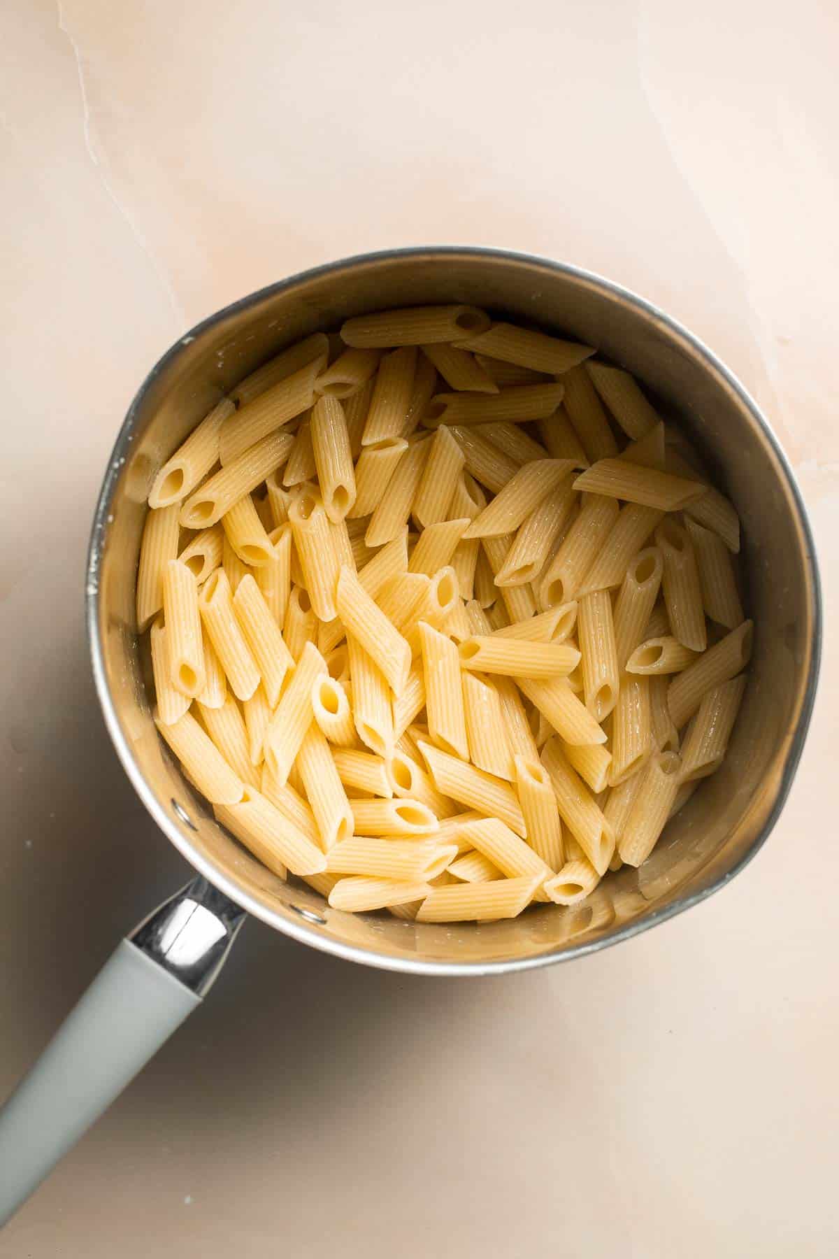 This Creamy Tomato Pasta is a simple and delicious meal made from scratch in 25 minutes with a cream and tomato based sauce that is rich and silky smooth. | aheadofthyme.com