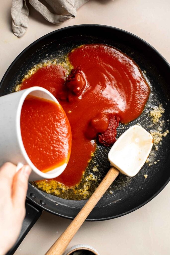 This Creamy Tomato Pasta is a simple and delicious meal made from scratch in 20 minutes with a cream and tomato based sauce that is rich and silky smooth. | aheadofthyme.com