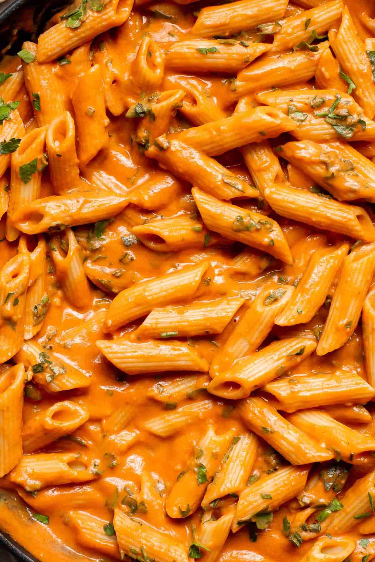 This Creamy Tomato Pasta is a simple and delicious meal made from scratch in 25 minutes with a cream and tomato based sauce that is rich and silky smooth. | aheadofthyme.com