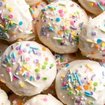 Italian Easter Cookies are cake-like cookies that are light and fluffy with lemon flavor throughout and topped with an easy homemade glaze and sprinkles. | aheadofthyme.com
