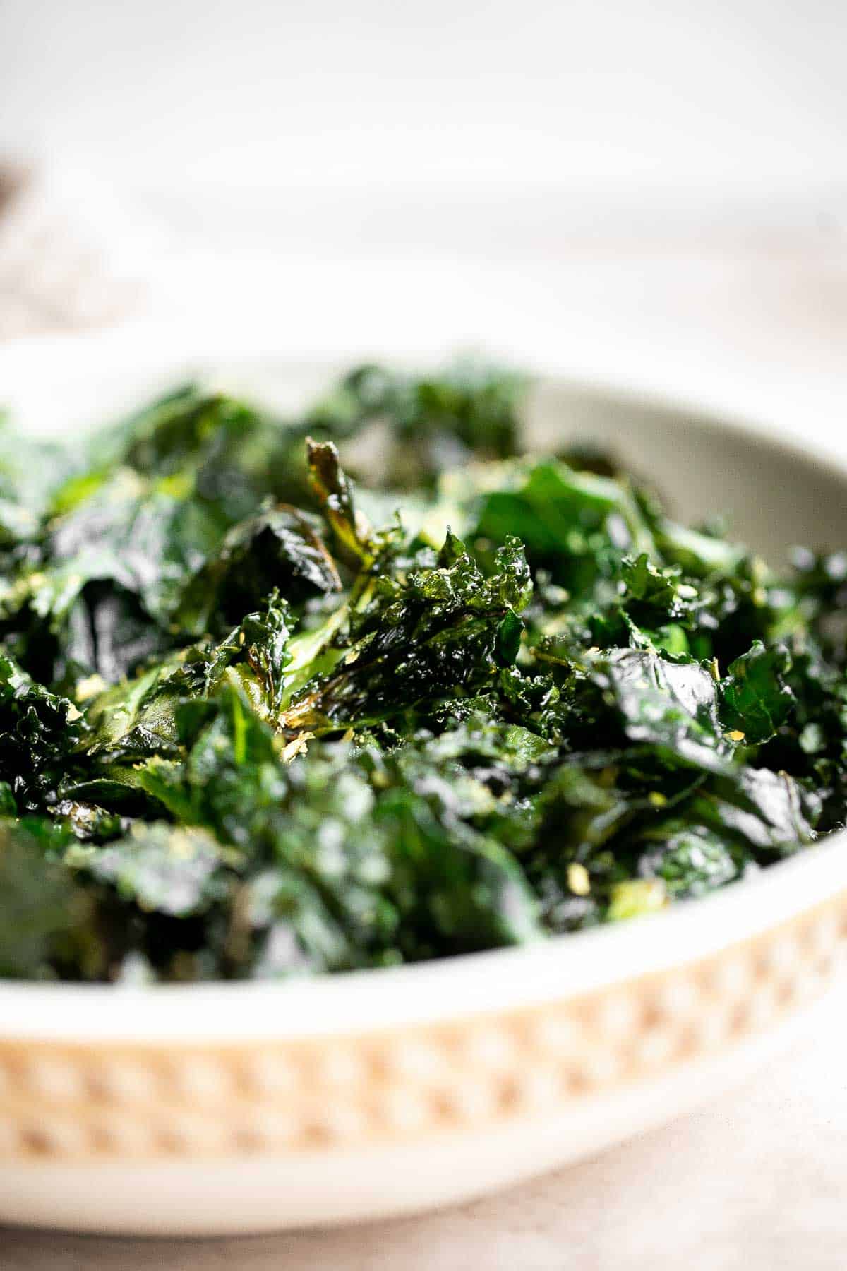 You’ll never want to buy chips after trying these incredibly light and crispy homemade Kale Chips! They’re completely vegan, easy to make, and healthy. | aheadofthyme.com