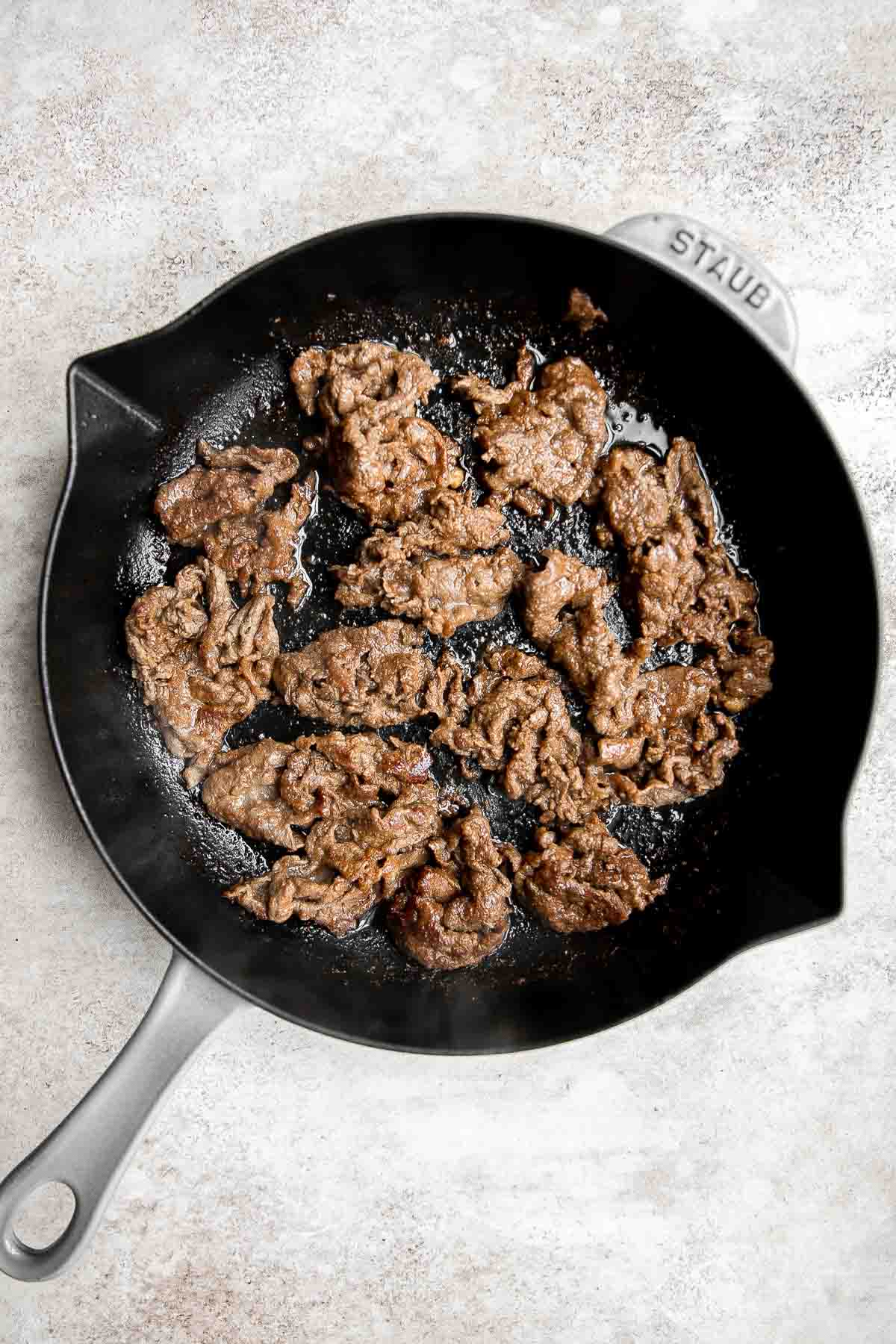 Korean Beef Bulgogi is a tasty, quick and easy 30-minute meal made with thinly sliced beef marinated in a delicious sweet and savory garlic soy sauce. | aheadofthyme.com