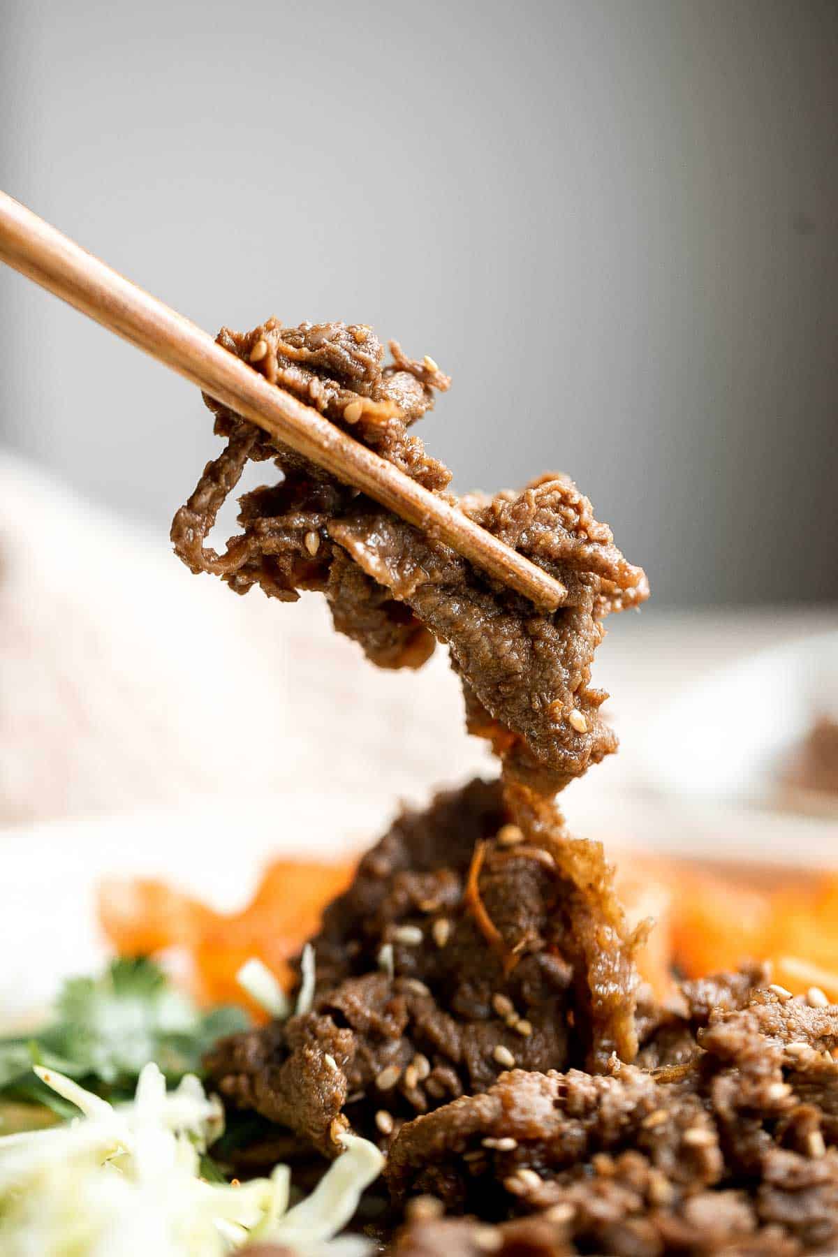 Korean Beef Bulgogi is a tasty, quick and easy 30-minute meal made with thinly sliced beef marinated in a delicious sweet and savory garlic soy sauce. | aheadofthyme.com